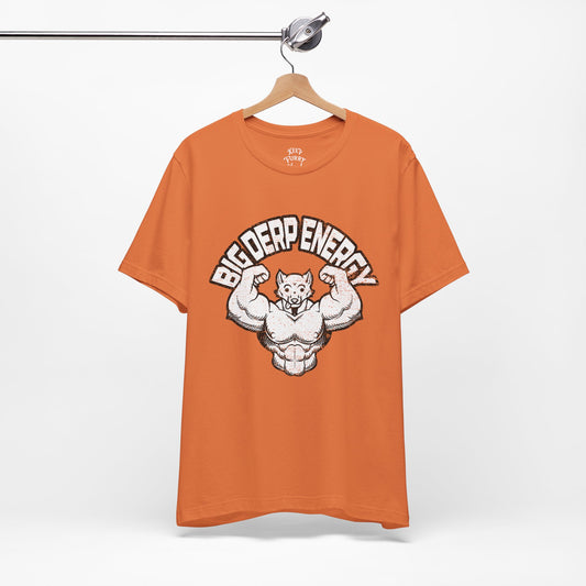 Orange t-shirt with Muscly Furry graphic on a hanger against a white background