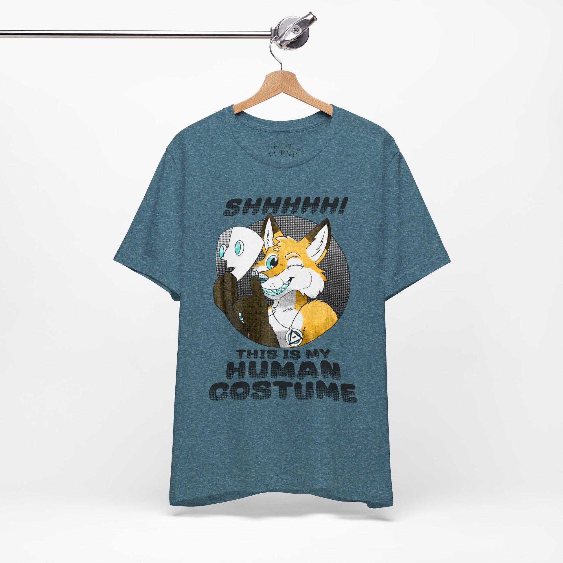 Blue t-shirt with cartoon characters and text on a hanger against a white background