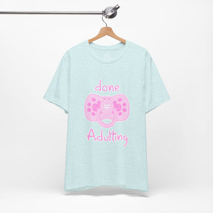 Light blue t-shirt with pink pacifier graphic and text on a white background